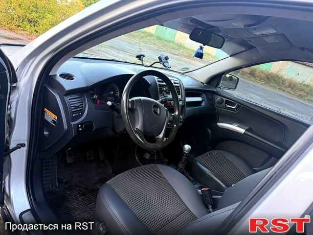 Сірий Кіа Sportage, об'ємом двигуна 2 л та пробігом 350 тис. км за 7900 $, фото 9 на Automoto.ua