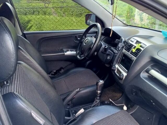 Серый Киа Sportage, объемом двигателя 2 л и пробегом 238 тыс. км за 9200 $, фото 10 на Automoto.ua