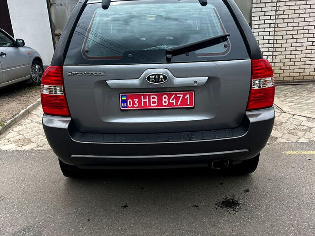 Серый Киа Sportage, объемом двигателя 2 л и пробегом 223 тыс. км за 8000 $, фото 2 на Automoto.ua