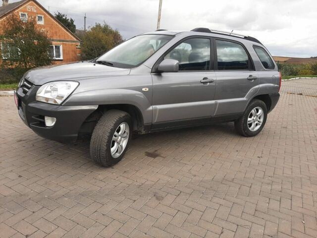Серый Киа Sportage, объемом двигателя 2 л и пробегом 240 тыс. км за 6599 $, фото 3 на Automoto.ua