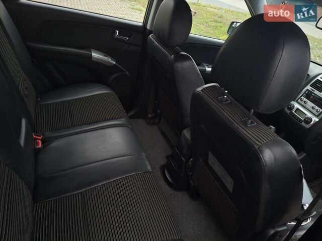 Серый Киа Sportage, объемом двигателя 2 л и пробегом 295 тыс. км за 8500 $, фото 29 на Automoto.ua