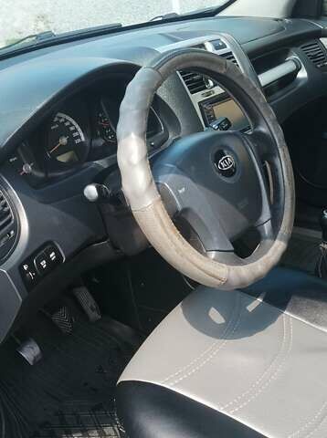 Серый Киа Sportage, объемом двигателя 2 л и пробегом 320 тыс. км за 6500 $, фото 6 на Automoto.ua