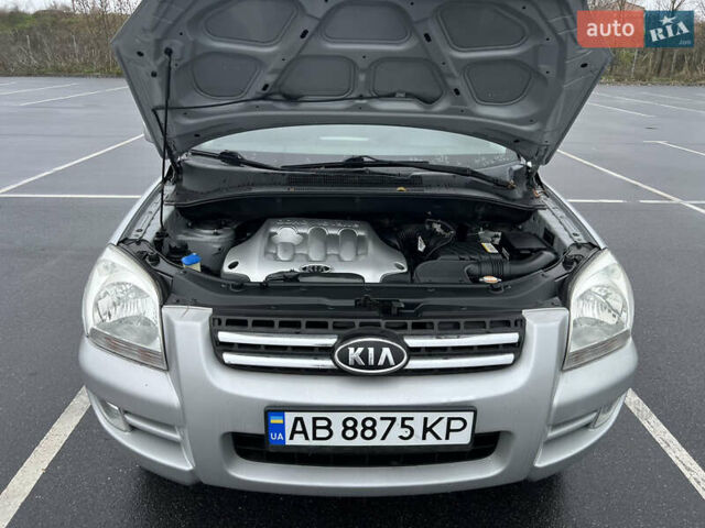 Серый Киа Sportage, объемом двигателя 2 л и пробегом 218 тыс. км за 8500 $, фото 34 на Automoto.ua