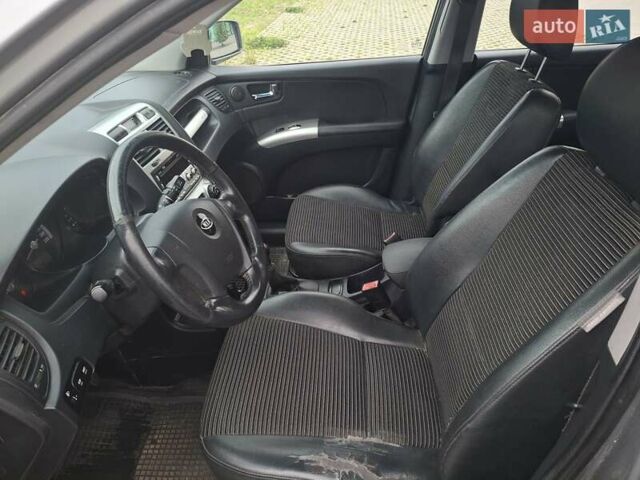 Серый Киа Sportage, объемом двигателя 2 л и пробегом 295 тыс. км за 8500 $, фото 7 на Automoto.ua
