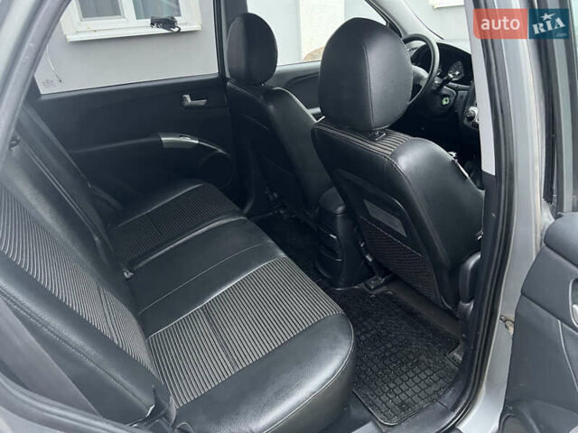Серый Киа Sportage, объемом двигателя 2 л и пробегом 270 тыс. км за 6599 $, фото 15 на Automoto.ua