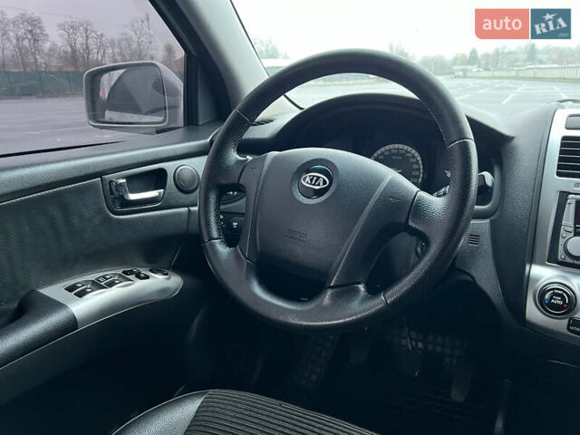 Серый Киа Sportage, объемом двигателя 2 л и пробегом 218 тыс. км за 8500 $, фото 32 на Automoto.ua