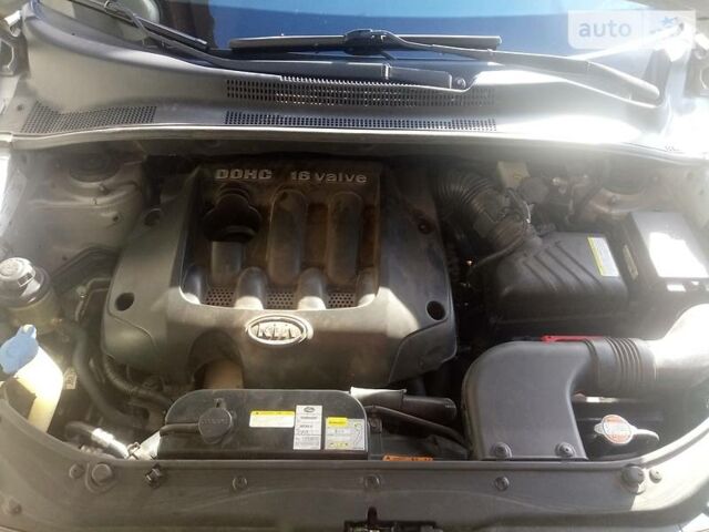 Серый Киа Sportage, объемом двигателя 2 л и пробегом 218 тыс. км за 6900 $, фото 22 на Automoto.ua