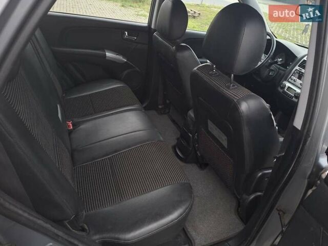 Серый Киа Sportage, объемом двигателя 2 л и пробегом 295 тыс. км за 8500 $, фото 31 на Automoto.ua