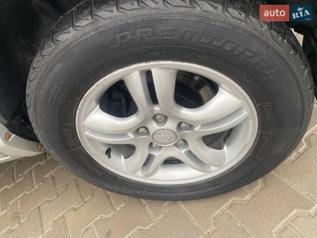 Серый Киа Sportage, объемом двигателя 2 л и пробегом 212 тыс. км за 8350 $, фото 11 на Automoto.ua