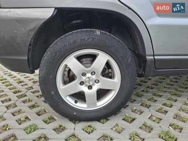 Серый Киа Sportage, объемом двигателя 2 л и пробегом 295 тыс. км за 8500 $, фото 60 на Automoto.ua