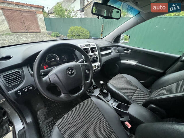 Серый Киа Sportage, объемом двигателя 2 л и пробегом 270 тыс. км за 6599 $, фото 11 на Automoto.ua