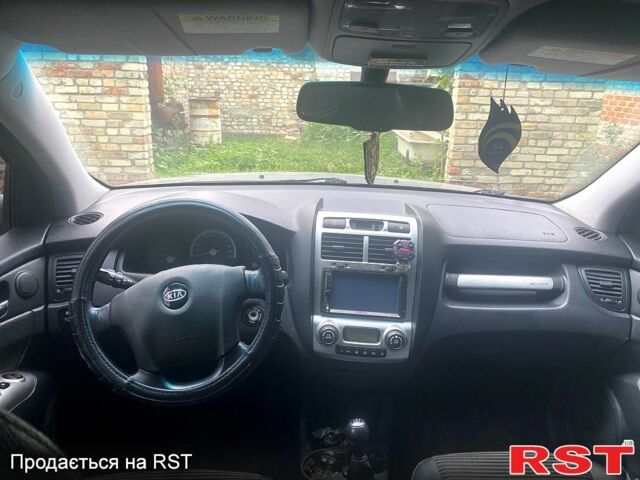 Серый Киа Sportage, объемом двигателя 2 л и пробегом 248 тыс. км за 7500 $, фото 4 на Automoto.ua
