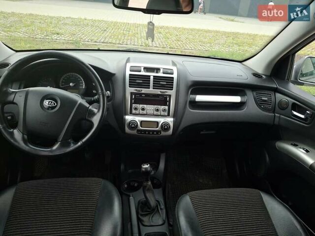 Серый Киа Sportage, объемом двигателя 2 л и пробегом 295 тыс. км за 8500 $, фото 27 на Automoto.ua