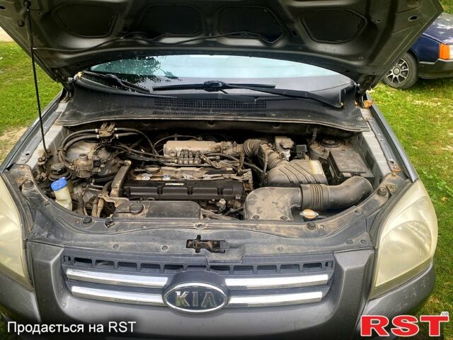 Серый Киа Sportage, объемом двигателя 2 л и пробегом 248 тыс. км за 7500 $, фото 8 на Automoto.ua
