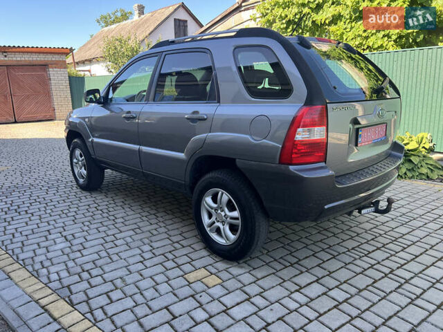 Серый Киа Sportage, объемом двигателя 2 л и пробегом 270 тыс. км за 6599 $, фото 3 на Automoto.ua