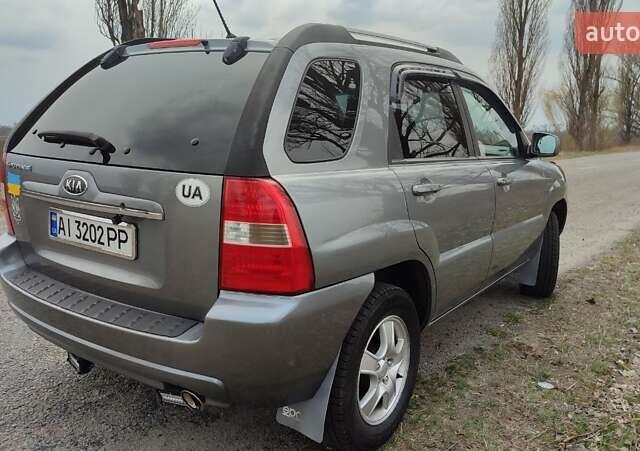 Сірий Кіа Sportage, об'ємом двигуна 2 л та пробігом 160 тис. км за 7900 $, фото 9 на Automoto.ua