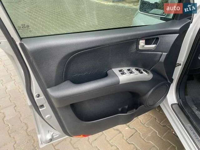 Серый Киа Sportage, объемом двигателя 2 л и пробегом 212 тыс. км за 8350 $, фото 22 на Automoto.ua
