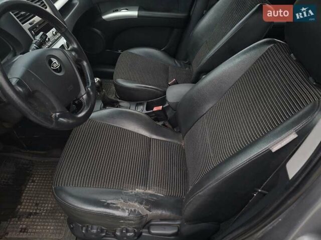 Серый Киа Sportage, объемом двигателя 2 л и пробегом 295 тыс. км за 8500 $, фото 17 на Automoto.ua