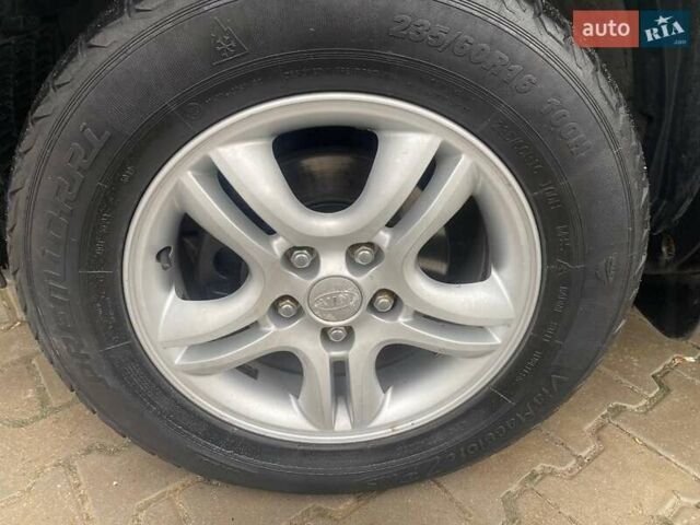 Серый Киа Sportage, объемом двигателя 2 л и пробегом 212 тыс. км за 8350 $, фото 30 на Automoto.ua