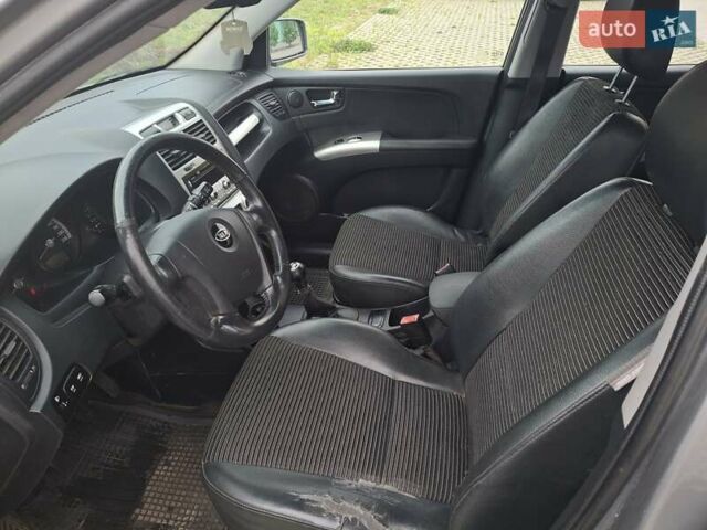 Серый Киа Sportage, объемом двигателя 2 л и пробегом 295 тыс. км за 8500 $, фото 11 на Automoto.ua