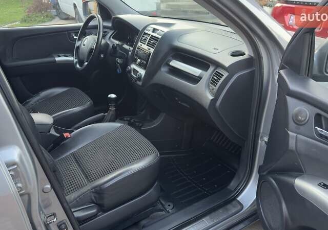 Серый Киа Sportage, объемом двигателя 2 л и пробегом 276 тыс. км за 7300 $, фото 10 на Automoto.ua