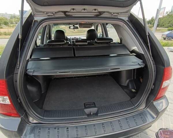Серый Киа Sportage, объемом двигателя 2 л и пробегом 197 тыс. км за 8000 $, фото 4 на Automoto.ua