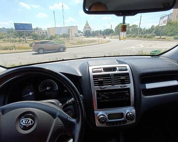 Серый Киа Sportage, объемом двигателя 2 л и пробегом 197 тыс. км за 8000 $, фото 14 на Automoto.ua