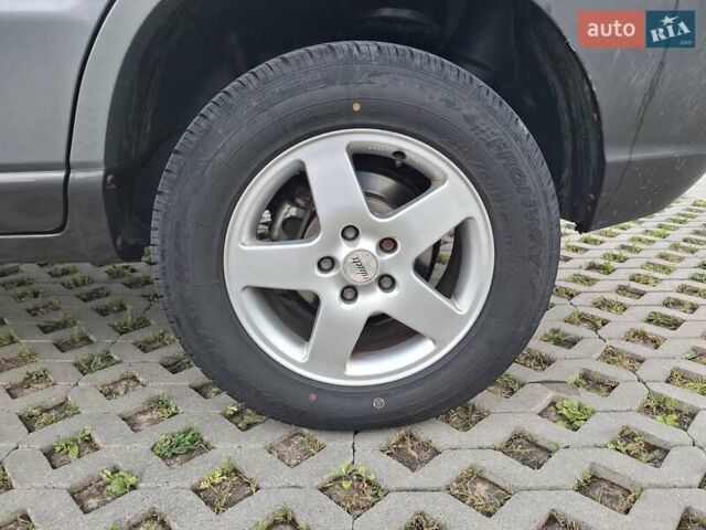 Серый Киа Sportage, объемом двигателя 2 л и пробегом 295 тыс. км за 8500 $, фото 59 на Automoto.ua
