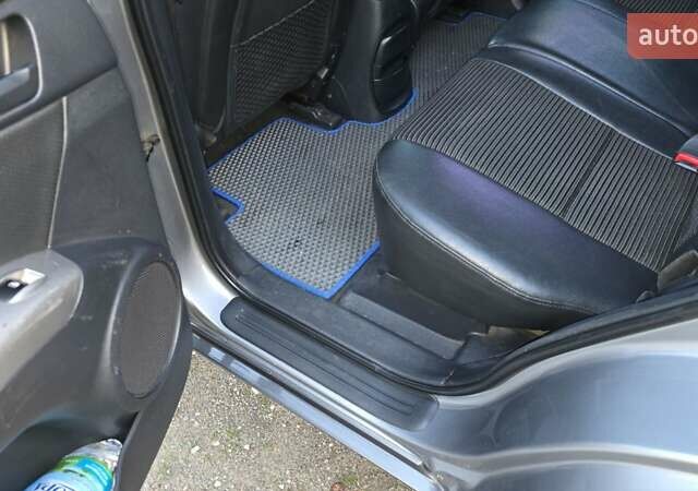 Серый Киа Sportage, объемом двигателя 1.99 л и пробегом 221 тыс. км за 8200 $, фото 14 на Automoto.ua