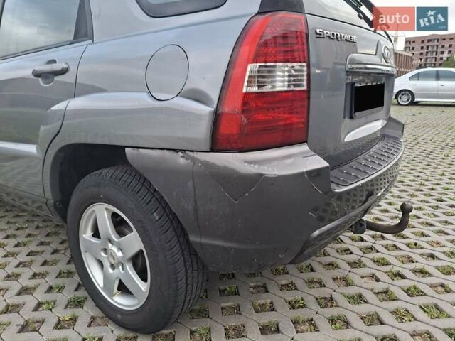 Серый Киа Sportage, объемом двигателя 2 л и пробегом 295 тыс. км за 8500 $, фото 70 на Automoto.ua