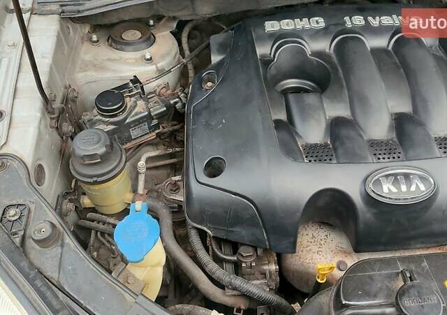 Сірий Кіа Sportage, об'ємом двигуна 2 л та пробігом 160 тис. км за 7900 $, фото 16 на Automoto.ua