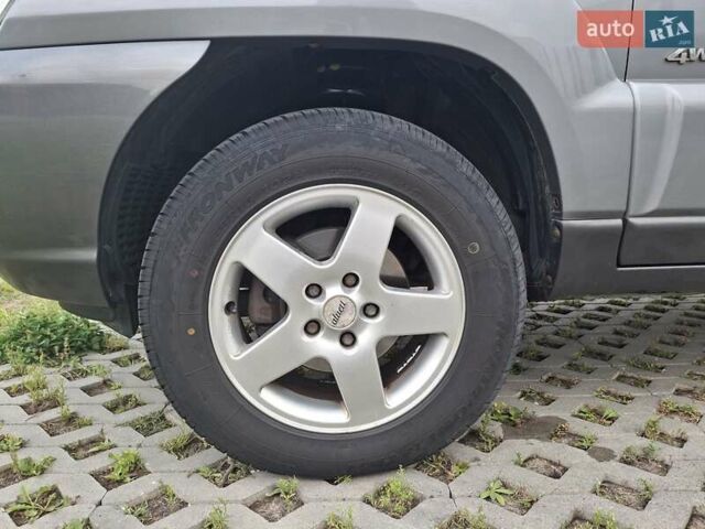 Серый Киа Sportage, объемом двигателя 2 л и пробегом 295 тыс. км за 8500 $, фото 57 на Automoto.ua