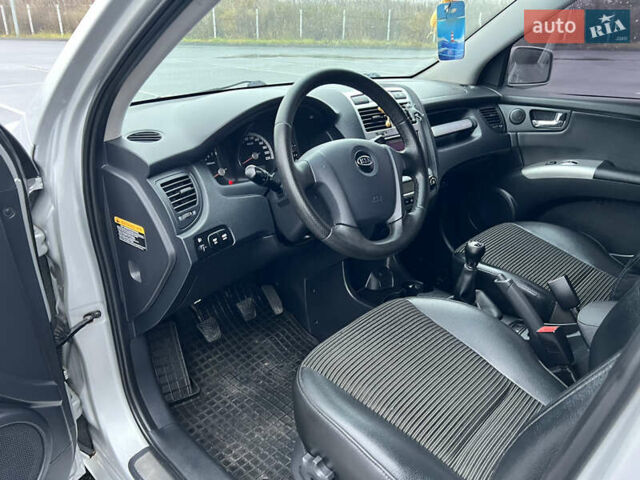 Серый Киа Sportage, объемом двигателя 2 л и пробегом 218 тыс. км за 8500 $, фото 28 на Automoto.ua