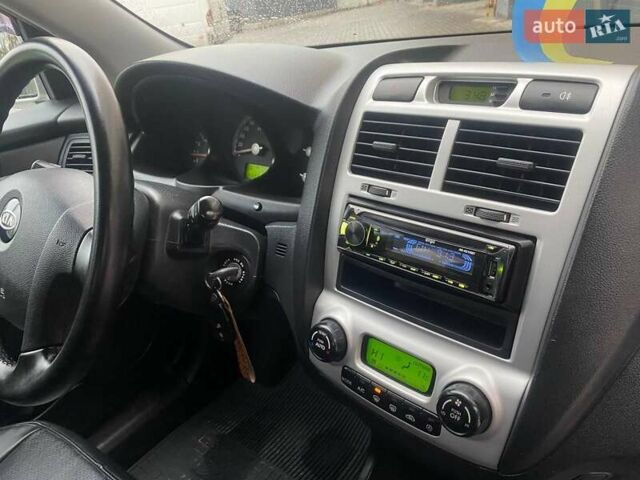 Серый Киа Sportage, объемом двигателя 2 л и пробегом 212 тыс. км за 8350 $, фото 31 на Automoto.ua
