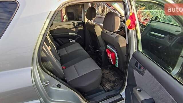 Серый Киа Sportage, объемом двигателя 2 л и пробегом 200 тыс. км за 8500 $, фото 4 на Automoto.ua
