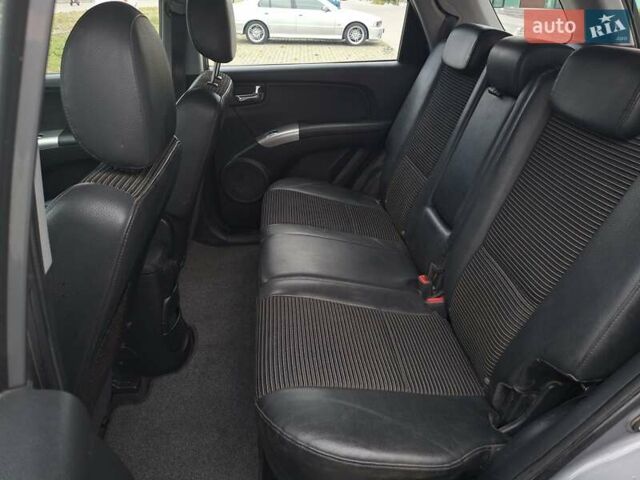 Серый Киа Sportage, объемом двигателя 2 л и пробегом 295 тыс. км за 8500 $, фото 22 на Automoto.ua