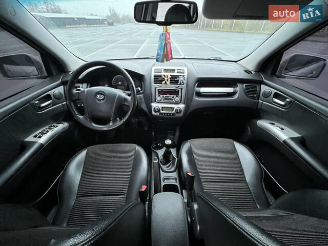 Серый Киа Sportage, объемом двигателя 2 л и пробегом 218 тыс. км за 8500 $, фото 30 на Automoto.ua