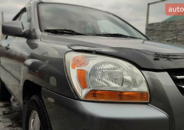 Сірий Кіа Sportage, об'ємом двигуна 2 л та пробігом 160 тис. км за 7900 $, фото 2 на Automoto.ua