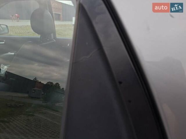 Серый Киа Sportage, объемом двигателя 2 л и пробегом 295 тыс. км за 8500 $, фото 48 на Automoto.ua