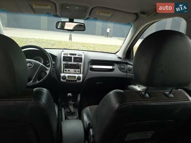 Серый Киа Sportage, объемом двигателя 2 л и пробегом 295 тыс. км за 8500 $, фото 21 на Automoto.ua