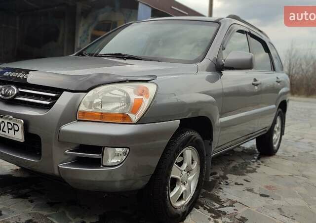 Сірий Кіа Sportage, об'ємом двигуна 2 л та пробігом 160 тис. км за 7900 $, фото 1 на Automoto.ua