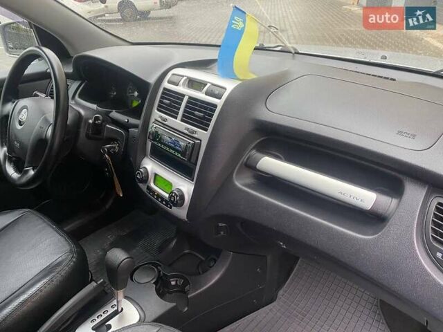 Серый Киа Sportage, объемом двигателя 2 л и пробегом 212 тыс. км за 8350 $, фото 26 на Automoto.ua