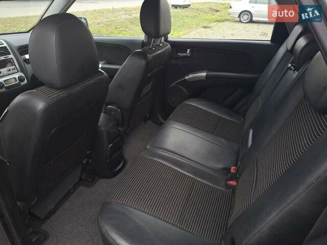 Серый Киа Sportage, объемом двигателя 2 л и пробегом 295 тыс. км за 8500 $, фото 19 на Automoto.ua