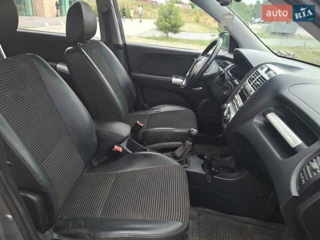 Серый Киа Sportage, объемом двигателя 2 л и пробегом 295 тыс. км за 8500 $, фото 8 на Automoto.ua