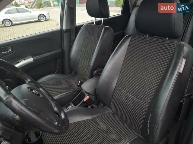 Серый Киа Sportage, объемом двигателя 2 л и пробегом 295 тыс. км за 8500 $, фото 12 на Automoto.ua