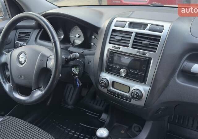 Серый Киа Sportage, объемом двигателя 2 л и пробегом 276 тыс. км за 7300 $, фото 11 на Automoto.ua