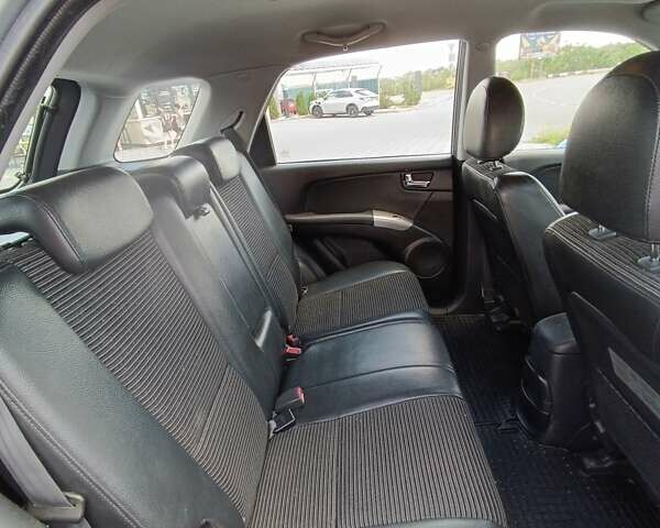 Серый Киа Sportage, объемом двигателя 2 л и пробегом 197 тыс. км за 8000 $, фото 9 на Automoto.ua