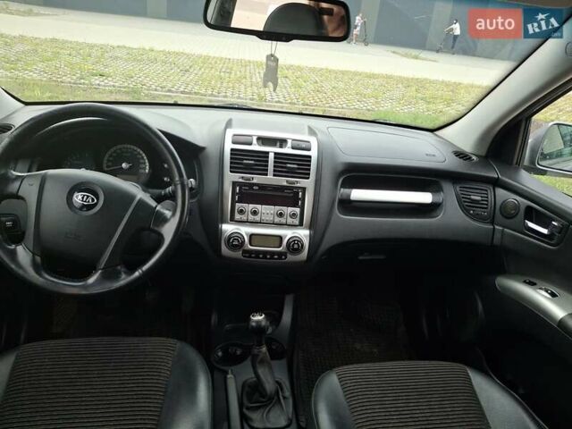 Серый Киа Sportage, объемом двигателя 2 л и пробегом 295 тыс. км за 8500 $, фото 23 на Automoto.ua