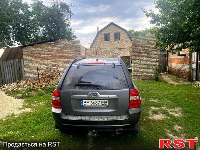 Серый Киа Sportage, объемом двигателя 2 л и пробегом 248 тыс. км за 7500 $, фото 1 на Automoto.ua