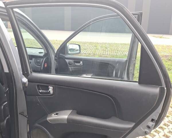 Серый Киа Sportage, объемом двигателя 2 л и пробегом 295 тыс. км за 8500 $, фото 32 на Automoto.ua